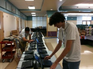 dbSys technicians preparing computers